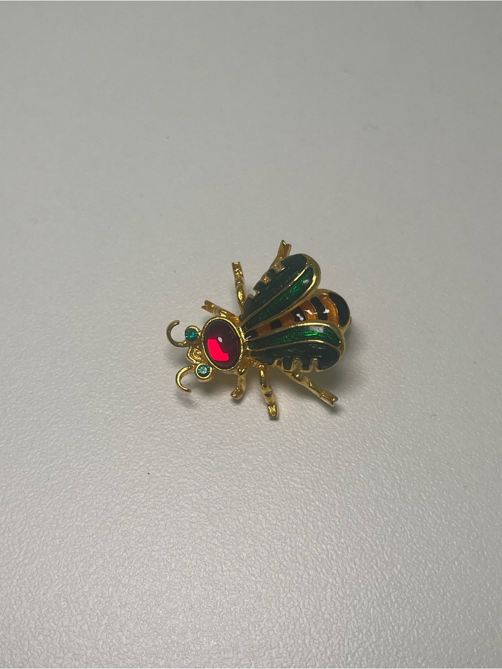Joan Rivers Gold-Tone Bee Brooch with Green Enamel & Red Crystal